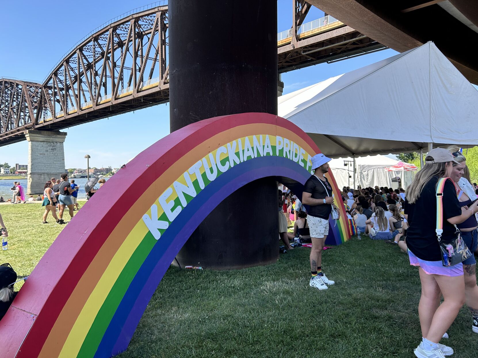 People pose for photos at Kentuckiana Pride Festival